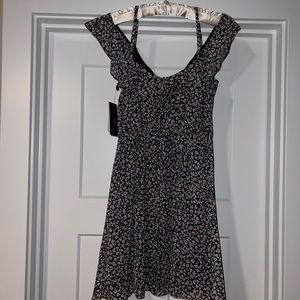 NWT. Semi Formal off the shoulder floral dress. Size Small